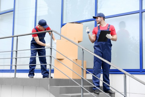 Professional movers handling furniture during a Stockwell relocation