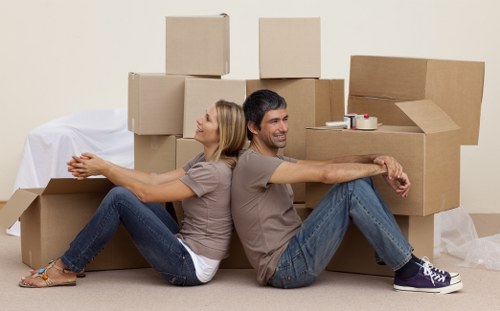 Packed boxes and wrapped household items ready for removal