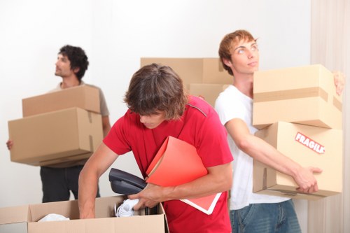 Packed boxes and furniture ready for removals in a Stockwell flat