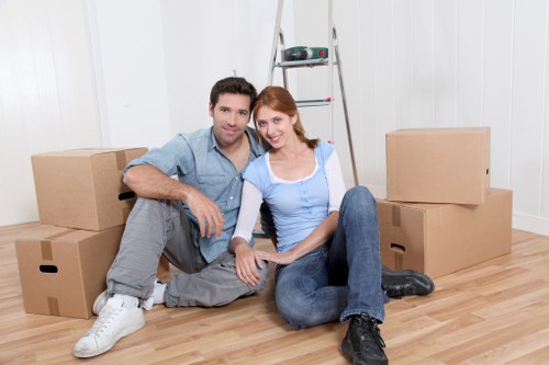 Careful loading of boxes and furniture into a moving truck