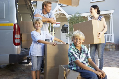 Organized moving day preparation with boxes and labels